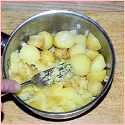 crushing new potatoes