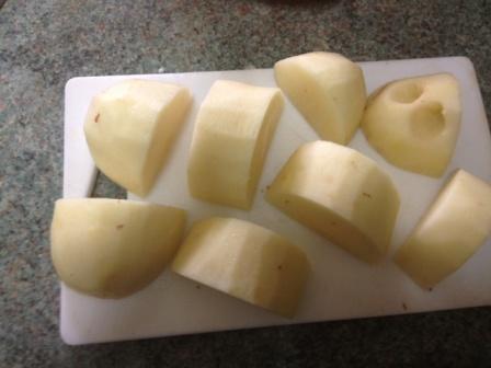 peeled and cut potatoes ready for roasting peeled and cut potatoes ready for roasting