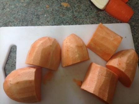 peeled and cut sweet potato ready for roasting